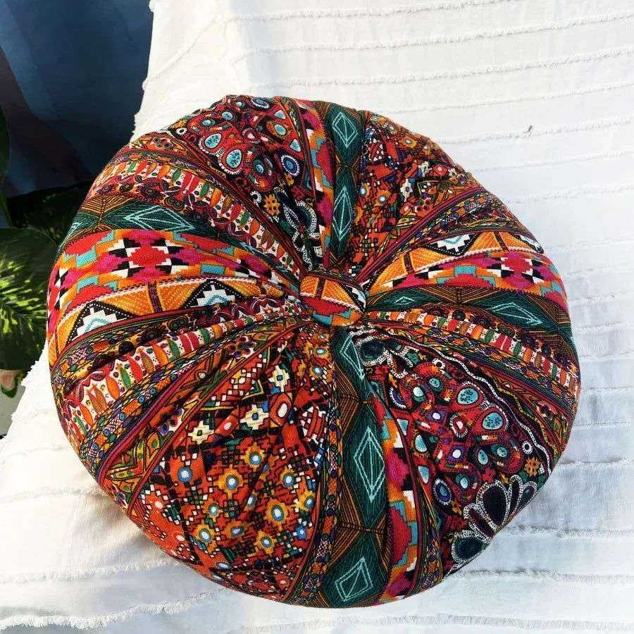 Handmade Boho Round Thick Floor Cushion with vibrant colors and central button design on white fabric background.