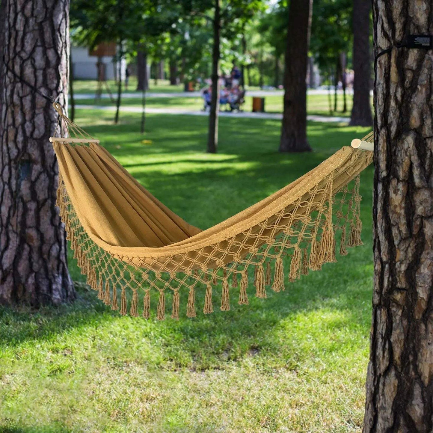 Gold, turquoise, grey double hammock with macramé and wood bars.