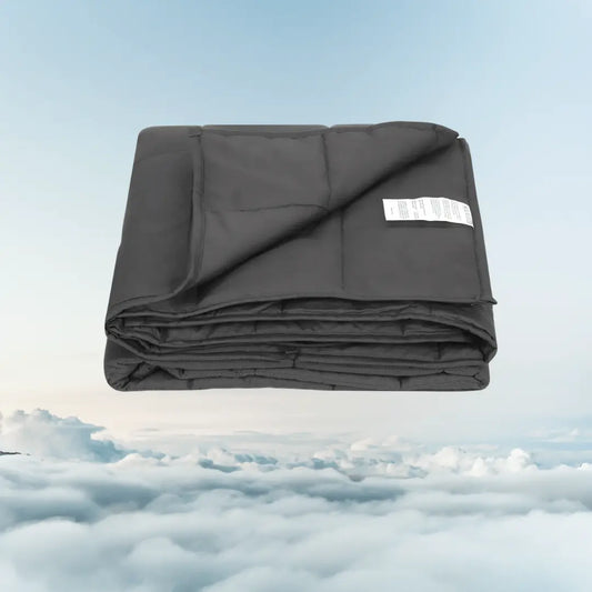 Weighted blanket in elegant dark grey, twin size, 15 lbs, made from breathable natural cotton for relaxation and stress reduction.