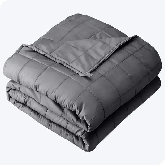 Dark grey king-size weighted blanket, 30 lbs, made from breathable cotton with reinforced stitching, folded neatly.