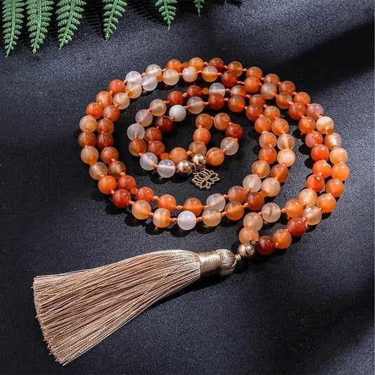 Carnelian Mala with Golden Lotus – 108 Knotted Beads for Strength & Vitality - Serenevi