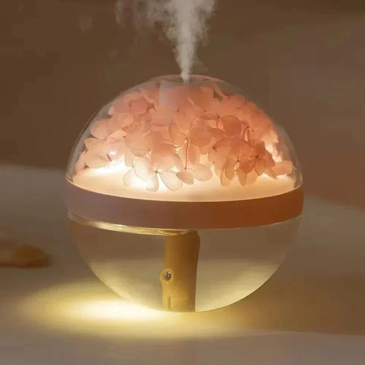 Flower-shaped ultrasonic humidifier with color-shifting LED light and mist output.