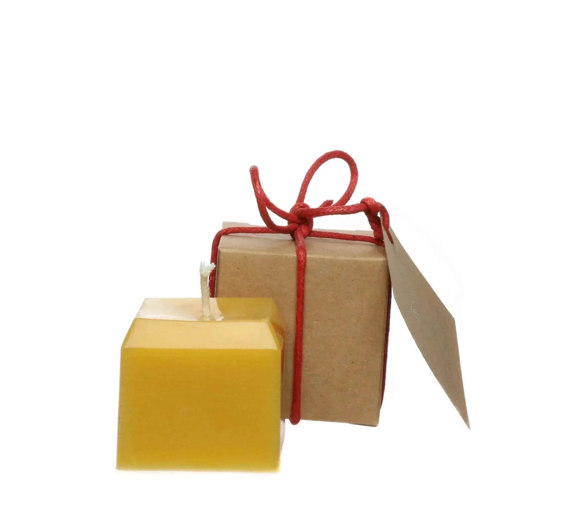 Pure beeswax candle with eco-friendly packaging, 100% natural ingredients.